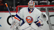 Apr 22, 2024; Raleigh, North Carolina, USA; New York Islanders goaltender Ilya Sorokin (30) watches the shot during the warmups before the game against the Carolina Hurricanes in game two of the first round of the 2024 Stanley Cup Playoffs at PNC Arena. Mandatory Credit: James Guillory-Imagn Images