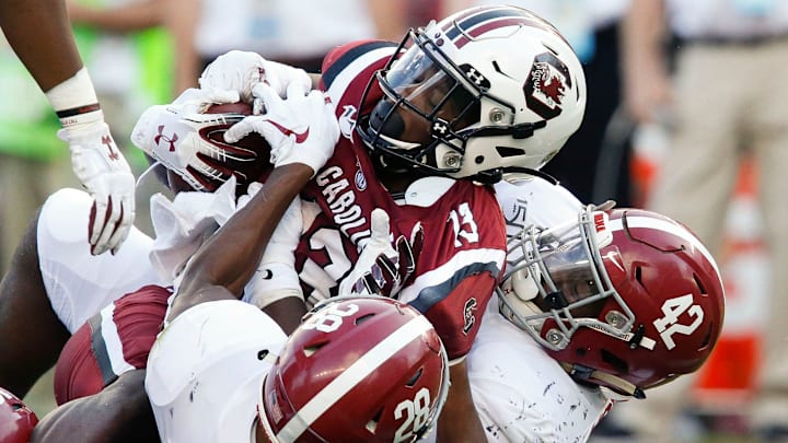 Alabama defensive back Josh Jobe (28) and Alabama linebacker Jaylen Moody (42) bring down South Carolina wide receiver Shi Smith (13) on a kick off return during Alabama's 47-23 victory over South Carolina in Columbia Saturday, Sept. 14, 2019. [Staff Photo/Gary Cosby Jr.]

Alabama Defeats South Carolina