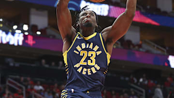 Oct 10, 2023; Houston, Texas, USA; Indiana Pacers forward Aaron Nesmith (23) dunks the ball during the third quarter against the Houston Rockets at Toyota Center. Mandatory Credit: Troy Taormina-Imagn Images