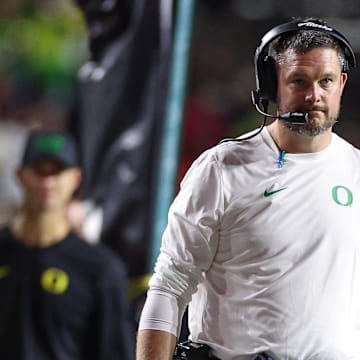 Oct 18, 2025; Piscataway, New Jersey, USA;  Oregon Ducks head coach Dan Lanning looks on during the first half against the Rutgers Scarlet Knights at SHI Stadium. Mandatory Credit: Vincent Carchietta-Imagn Images