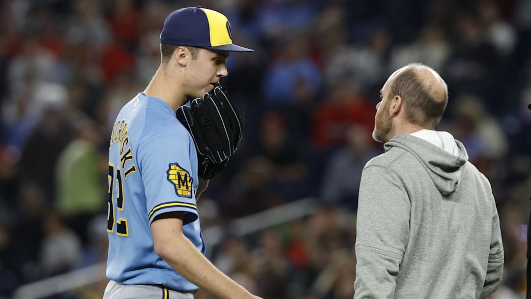 May 1, 2026; Washington, District of Columbia, USA; Milwaukee Brewers pitcher Jacob Misiorowski (32) talks with Brewers head trainer Brad Epstein (R) after an injury against the Washington Nationals during the sixth inning at Nationals Park. Mandatory Credit: Geoff Burke-Imagn Images