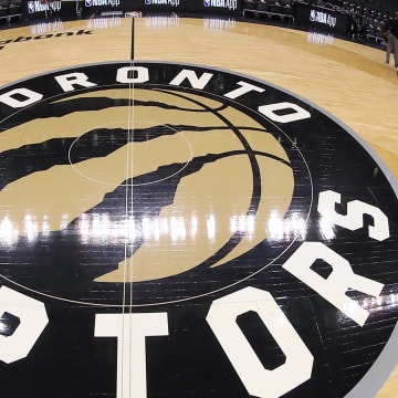 Mar 1, 2019; Toronto, Ontario, CAN; A general view of the Toronto Raptors logo at center court before the start of a game between the Raptors and the Portland Trail Blazers at Scotiabank Arena. Mandatory Credit: Tom Szczerbowski-USA TODAY Sports