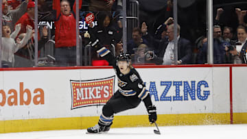 Nov 29, 2024; Washington, District of Columbia, USA; Washington Capitals defenseman Jakob Chychrun (6) celebrates after scoring the game-winning overtime goal against the New York Islanders at Capital One Arena. Mandatory Credit: Geoff Burke-Imagn Images