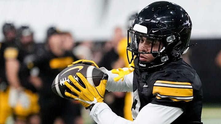 Iowa wide receiver Sam Phillips (2) makes a catch in practice Thursday, April 3, 2025 in Iowa City, Iowa. Iowa wide receiver Sam Phillips (2) makes a catch in practice Thursday, April 3, 2025 in Iowa City, Iowa.