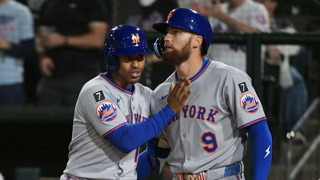 Apr 11, 2025; West Sacramento, California, USA; New York Mets shortstop Francisco Lindor (12) celebrates with outfielder Brandon Nimmo (9) after the Mets scored against the Oakland Athletics during the sixth inning at Sutter Health Park. Mandatory Credit: Ed Szczepanski-Imagn Images