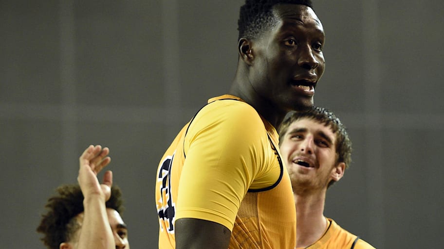 UC Irvine Anteaters forward Mike Best celebrates with center Mamadou Ndiaye.