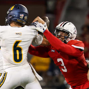 Sep 7, 2024; Tucson, Arizona, USA; Arizona Wildcats defensive lineman Tre Smith (3) forces Northern Arizona Lumberjack quarterback Ty Pennington (6) to fumble the ball during the fourth quarter at Arizona Stadium. 