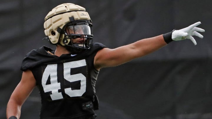 Purdue Boilermakers running back Devin Mockobee (45) runs a drill 