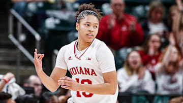 Indiana Hoosiers guard Jaelynn Penn (13) holds up three fingers after scoring three points during the Big Ten women's basketball tournament at Bankers Life Fieldhouse, Indianapolis, Friday, March 6, 2020. Indiana Hoosiers defeated Rutgers Scarlet Knights, 78-60.