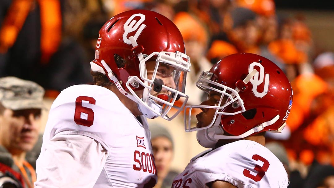 Oklahoma Sooners quarterback Baker Mayfield (6) celebrates with wide receiver Sterling Shepard