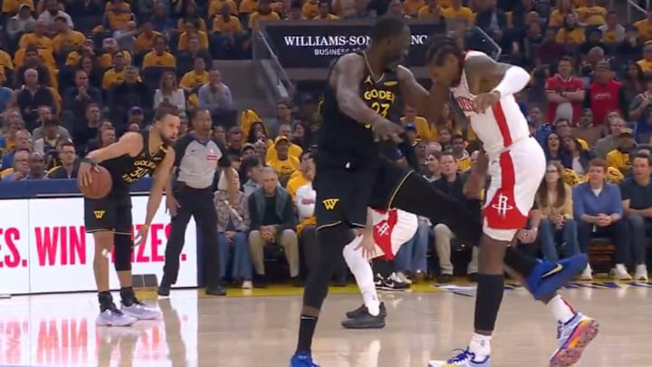 Stephen Curry watches as Draymond Green flagrantly fouls Houston’s Jalen Green. Stephen Curry watches as Draymond Green flagrantly fouls Houston’s Jalen Green.