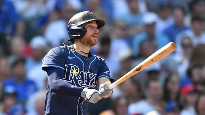 Sep 13, 2025; Chicago, Illinois, USA; Tampa Bay Rays second baseman Brandon Lowe (8) hits an RBI single against the Chicago Cubs during the sixth inning at Wrigley Field. Mandatory Credit: Patrick Gorski-Imagn Images