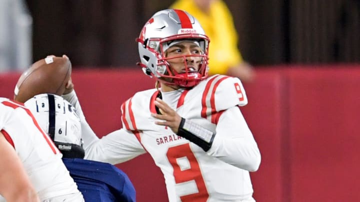 Saraland's Karle Lacey, Jr., (9) passes against Clay-Chalkville during the AHSAA Class 6A football state championship game at Bryant Denny Stadium in Tuscaloosa, Ala., on Friday December 8, 2023.