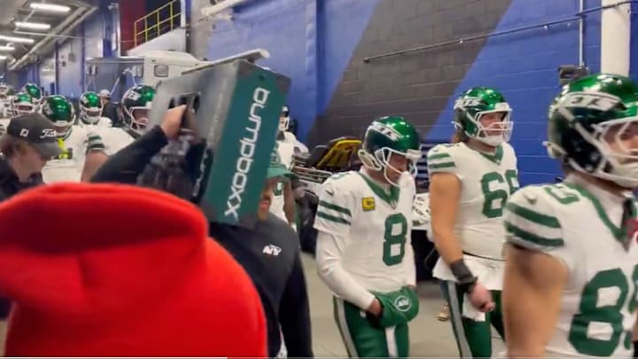 Aaron Rodgers and the New York Jets walk out to the field in Buffalo. Aaron Rodgers and the New York Jets walk out to the field in Buffalo.