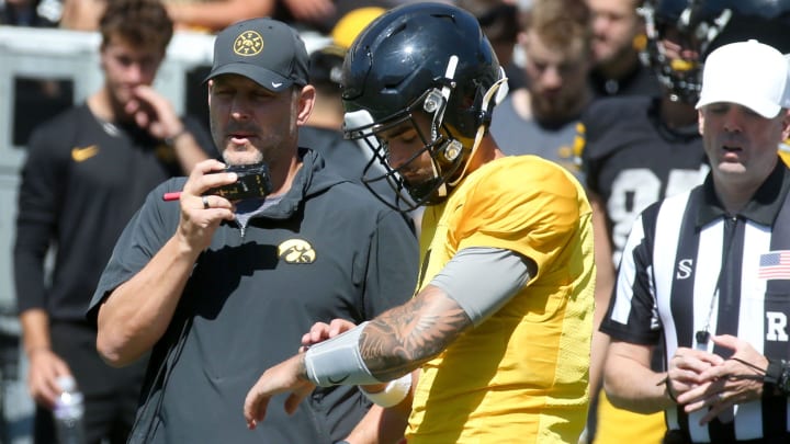 Iowa offensive coordinator Tim Lester calls a play during Kids Day at Kinnick Saturday, Aug. 10, 2024 at Kinnick Stadium in Iowa City, Iowa.