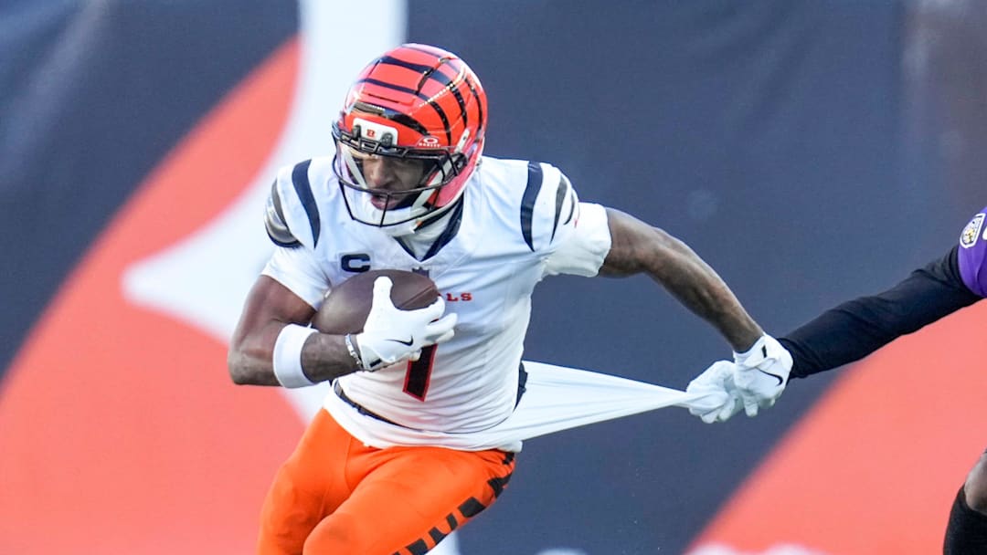 Cincinnati Bengals wide receiver Ja'Marr Chase (1) is pulled on by Baltimore Ravens cornerback Nate Wiggins (2) after a catch in the fourth quarter of the NFL Week 15 game between the Cincinnati Bengals and the Baltimore Ravens at Paycor Stadium in Cincinnati on Sunday, Dec. 14, 2025. The Bengals were shut out, 24-0. Cincinnati Bengals wide receiver Ja'Marr Chase (1) is pulled on by Baltimore Ravens cornerback Nate Wiggins (2) after a catch in the fourth quarter of the NFL Week 15 game between the Cincinnati Bengals and the Baltimore Ravens at Paycor Stadium in Cincinnati on Sunday, Dec. 14, 2025. The Bengals were shut out, 24-0.