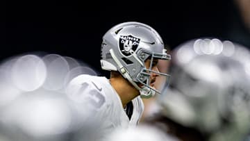 Dec 29, 2024; New Orleans, Louisiana, USA;  Las Vegas Raiders quarterback Aidan O'Connell (12) calls for the ball against the New Orleans Saints during the first half at Caesars Superdome. Mandatory Credit: Stephen Lew-Imagn Images