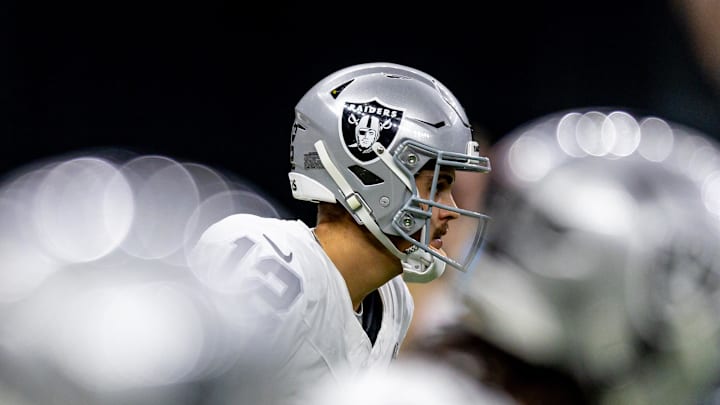 Dec 29, 2024; New Orleans, Louisiana, USA;  Las Vegas Raiders quarterback Aidan O'Connell (12) calls for the ball against the New Orleans Saints during the first half at Caesars Superdome. Mandatory Credit: Stephen Lew-Imagn Images