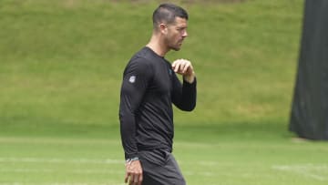 Jun 4, 2024; Charlotte, NC, USA; Carolina Panthers Head Coach Dave Canales walks across the field during OTAs.
