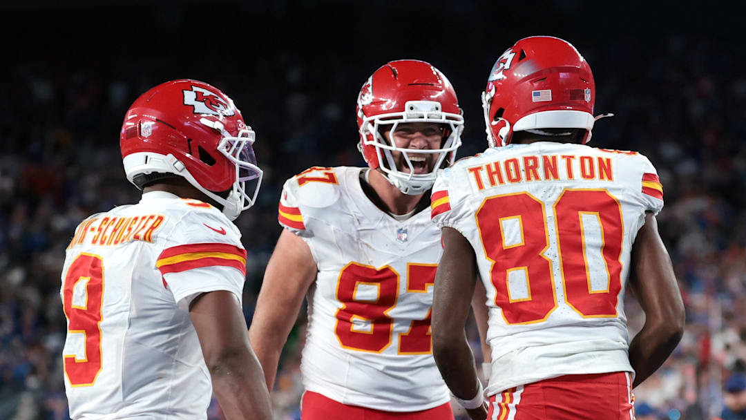 Sep 21, 2025; East Rutherford, New Jersey, USA; Kansas City Chiefs wide receiver Tyquan Thornton (80) celebrates with tight end Travis Kelce (87) and wide receiver Juju Smith-Schuster (9) after a reception against the New York Giants in the fourth quarter at MetLife Stadium. Mandatory Credit: Vincent Carchietta-Imagn Images