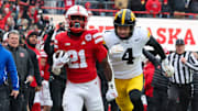 Nebraska running back Emmett Johnson takes off on a 70-yard run against Iowa.
