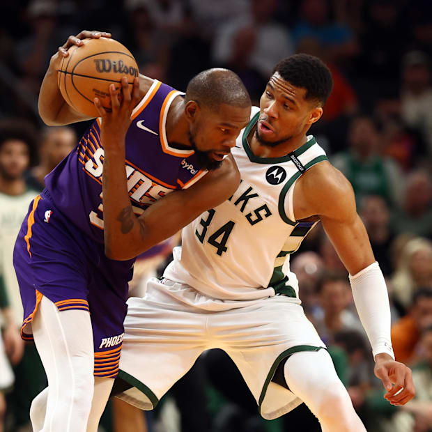 Milwaukee Bucks forward Giannis Antetokounmpo (34) defends against Phoenix Suns forward Kevin Durant
