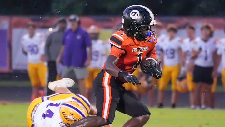 Spruce Creek's Cameron Oxendine (1) races down the field to score against Avon (Ohio) at Spruce Creek High in Port Orange last Thursday. Oxendine caught 10 passes for more than 200 yards and three touchdowns to lift the Hawks to a 25-22 victory. Spruce Creek's Cameron Oxendine (1) races down the field to score against Avon (Ohio) at Spruce Creek High in Port Orange last Thursday. Oxendine caught 10 passes for more than 200 yards and three touchdowns to lift the Hawks to a 25-22 victory.