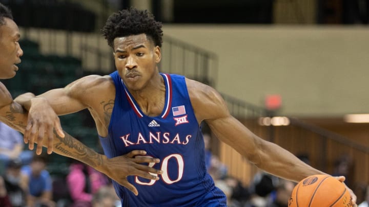 Nov 28, 2021; Orlando, FL, USA; Kansas Jayhawks guard Ochai Agbaji (30) dribbles the ball against