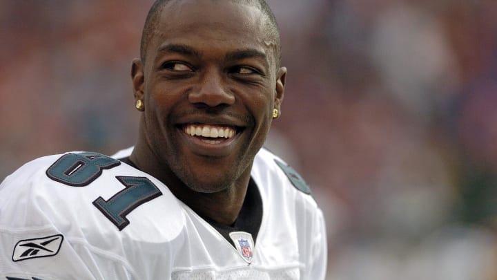 Oct 30, 2005; Denver, CO, USA; Philadelphia Eagles wide receiver Terrell Owens smiles in response to taunts from the crowd in the second quarter against the Denver Broncos at Invesco Field at Mile High.  Photo By Byron Hetzler-USA TODAY Sports Copyright (c) 2005 Byron Hetzler