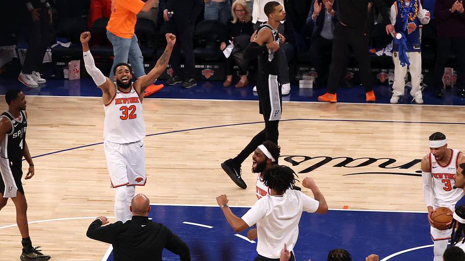 New York Knicks center Karl-Anthony Towns celebrates after defeating the San Antonio Spurs in Game 4.