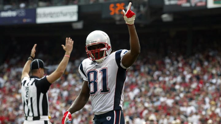 Oct. 5, 2008; San Francisco, CA, USA; New England Patriots wide receiver Randy Moss (81) celebrates after the Patriots scored a touchdown in the third quarter of the Patriots 30-21 win over the San Francisco 49ers at Candlestick Park in San Francisco, CA.  Mandatory Credit: Cary Edmondson-USA TODAY Sports