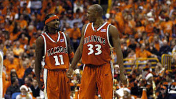 Dec 21, 2005; St. Louis, MO, USA;  Illinois guard Dee Brown (11) and guard Rich McBride (33) share a laugh during a timeout against Missouri during the second half at the Savvis Center in St. Louis, MO. Illinois defeated Missouri 82-50. Mandatory Credit:Scott Rovak-Imagn Images Copyright © Scott Rovak