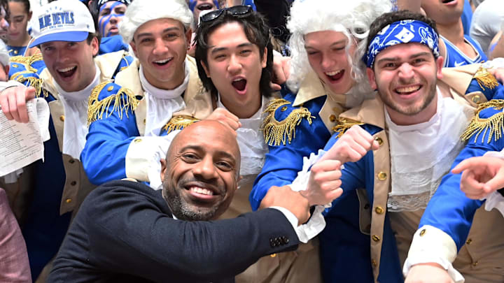 Mar 9, 2024; Durham, North Carolina, USA;  ESPN basketball commentator Jay Williams (front left) greets Duke students prior to a game between the North Carolina Tar Heels and the Duke Blue Devils at Cameron Indoor Stadium. Mandatory Credit: Rob Kinnan-Imagn Images