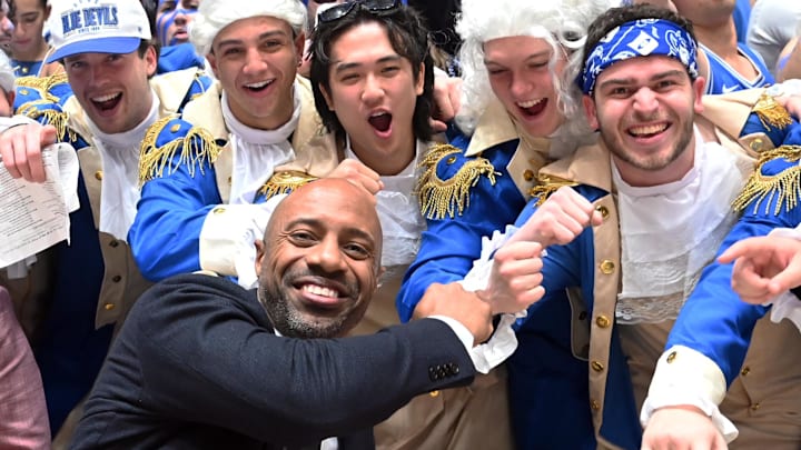 Mar 9, 2024; Durham, North Carolina, USA;  ESPN basketball commentator Jay Williams (front left) greets Duke students before a game between UNC and Duke.