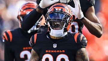 Dec 22, 2024; Cincinnati, Ohio, USA; Cincinnati Bengals running back Trayveon Williams (32) reacts after a play with safety Tycen Anderson (26) in the first half against the Cleveland Browns at Paycor Stadium. Mandatory Credit: Katie Stratman-Imagn Images