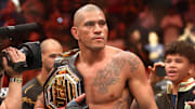 Apr 13, 2024; Las Vegas, Nevada, USA; Alex Pereira celebrates with the championship belt during UFC 300 at T-Mobile Arena. Mandatory Credit: Mark J. Rebilas-Imagn Images