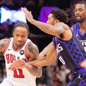 Mar 4, 2024; Sacramento, California, USA; Chicago Bulls forward DeMar DeRozan (11) drives to the basket against the Sacramento Kings during the fourth quarter at Golden 1 Center. 