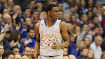 Feb 8, 2014; Lawrence, KS, USA; Kansas Jayhawks guard Andrew Wiggins (22) runs down court after scoring in the first half against the West Virginia Mountaineers.