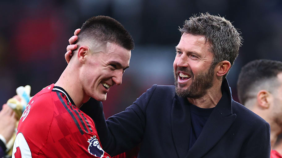 Benjamin Šeško (left) and Michael Carrick.