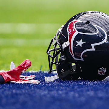 Sep 18, 2016; Houston, TX, USA; General view of a Houston Texans helmet and gloves before a game against the Kansas City Chiefs at NRG Stadium. Mandatory Credit: Troy Taormina-Imagn Images