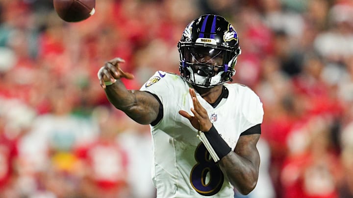 Sep 5, 2024; Kansas City, Missouri, USA; Baltimore Ravens quarterback Lamar Jackson (8) throws a pass during the second half against the Kansas City Chiefs at GEHA Field at Arrowhead Stadium. Mandatory Credit: Jay Biggerstaff-Imagn Images