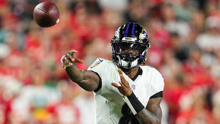 Baltimore Ravens quarterback Lamar Jackson (8) throws a pass during the second half against the Kansas City Chiefs at GEHA Field at Arrowhead Stadium. 