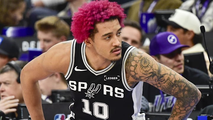 Jan 22, 2026; Salt Lake City, Utah, USA; San Antonio Spurs forward Jeremy Sochan (10) stretches before substituting in during the second half against the Utah Jazz at Delta Center. Mandatory Credit: Peter Creveling-Imagn Images