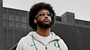 Oct 11, 2025; Eugene, Oregon, USA; Oregon Ducks quarterback Dante Moore (5) arrives with his teammates before the game against the Indiana Hoosiers at Autzen Stadium. Mandatory Credit: Troy Wayrynen-Imagn Images