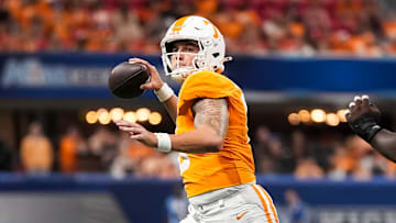 Tennessee quarterback Joey Aguilar (6) scrambles during the Aflac Kickoff Game between the Volunteers and Syracuse held at Mercedes-Benz Stadium in Atlanta, Ga., on August 30, 2025.