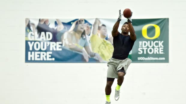 March 14, 2013; Eugene, OR, USA;  Oregon Ducks running back Kenjon Barner catches the football during Oregon pro day at Mosho