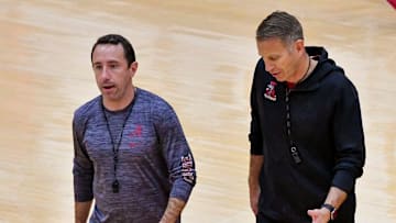 Alabama assistant coach Brian Adams and Alabama head coach Nate Oats talk during a break in practice. The University of Alabama men’s basketball team works out Thursday, Sept. 26, 2024.