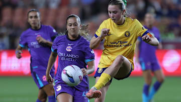 May 23, 2025; Sandy, Utah, USA; Utah Royals FC defender Kate Del Fava (8) kicks the ball away from Orlando Pride forward Summer Yates (28) during the second half at America First Field. Mandatory Credit: Rob Gray-Imagn Images