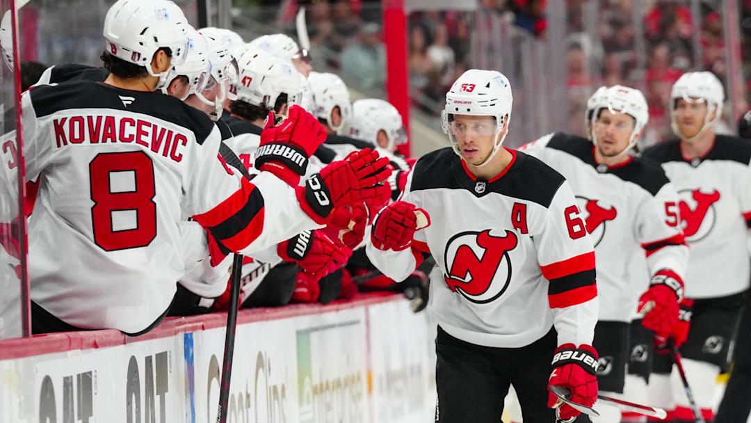 New Jersey Devils left wing Jesper Bratt (63) celebrates his goal against the Carolina Hurricanes. Mandatory Credit: James Guillory-Imagn Images