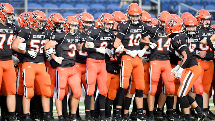 Coldwater players prepare to take the field.